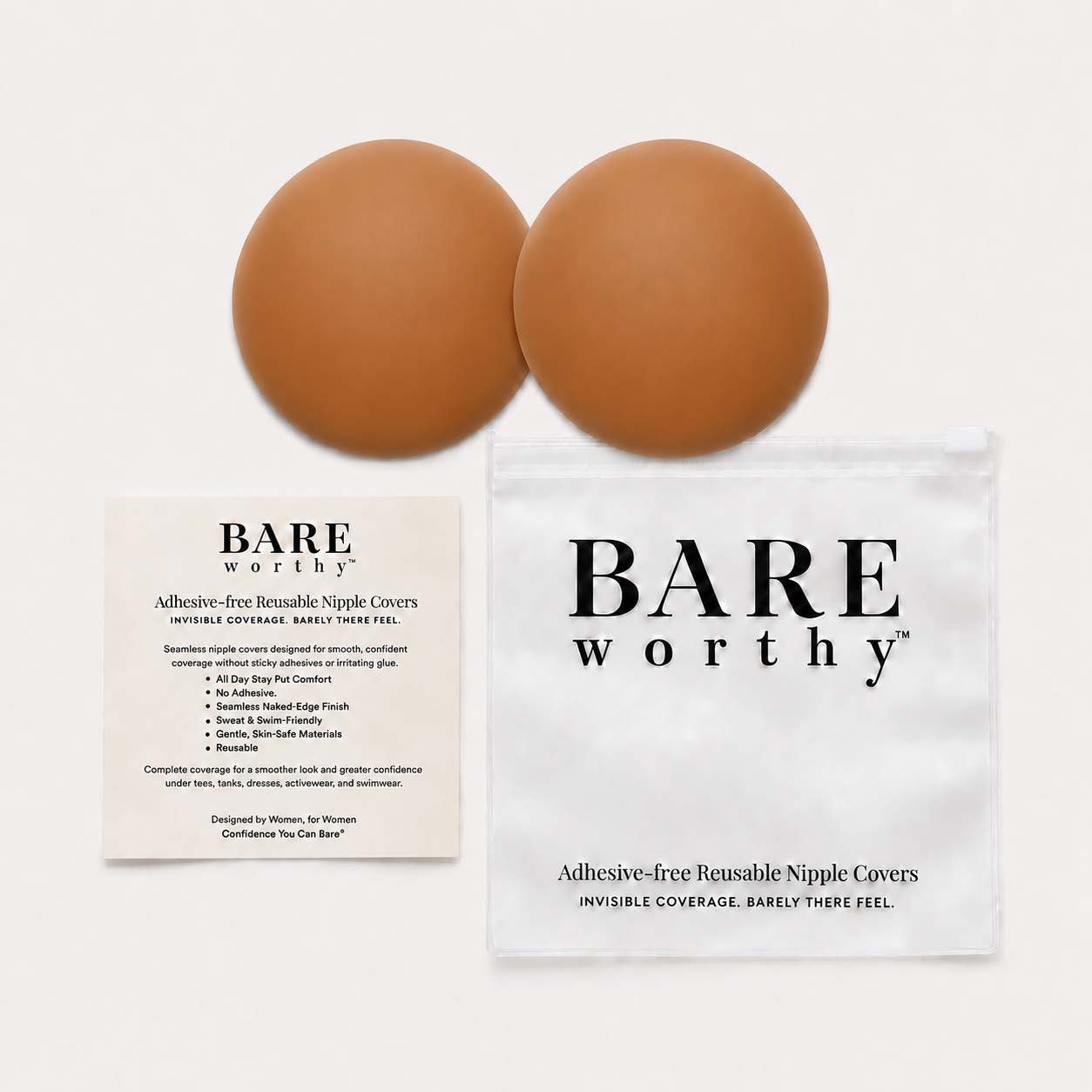 a pair of brown balls next to a white bag