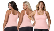 a group of women in pink tank tops